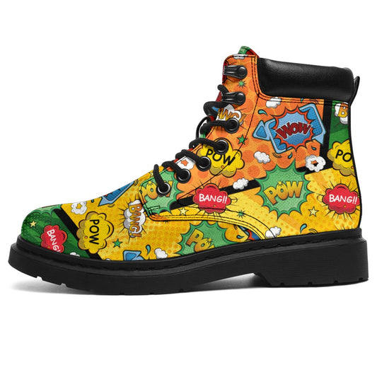 This is a microsuede pair of boots for men and women. It has a comic print, with words saying pow, bang, wow, in stars and clouds.  In orange, yellow, green, blue, and red colours all over the boots. The boot has a black sole black trim , black laces, and sits above the ankle. It is set on a white background.